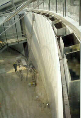 Cantilevered marble wall